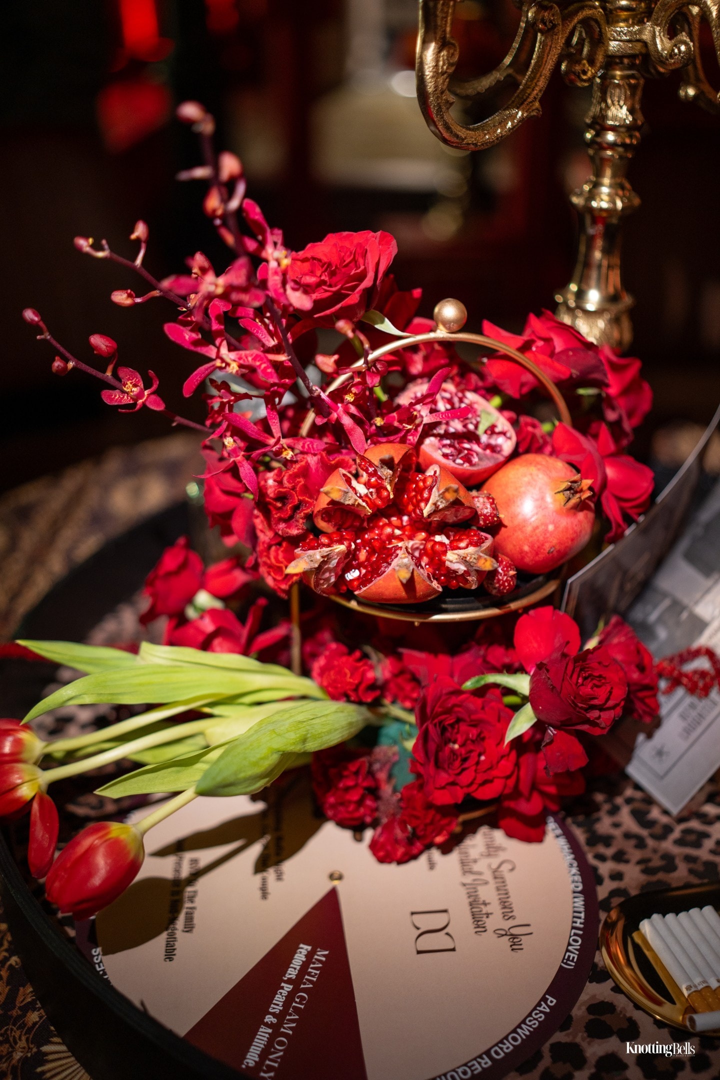 Divine Sinners red roses and pomegranate table décor