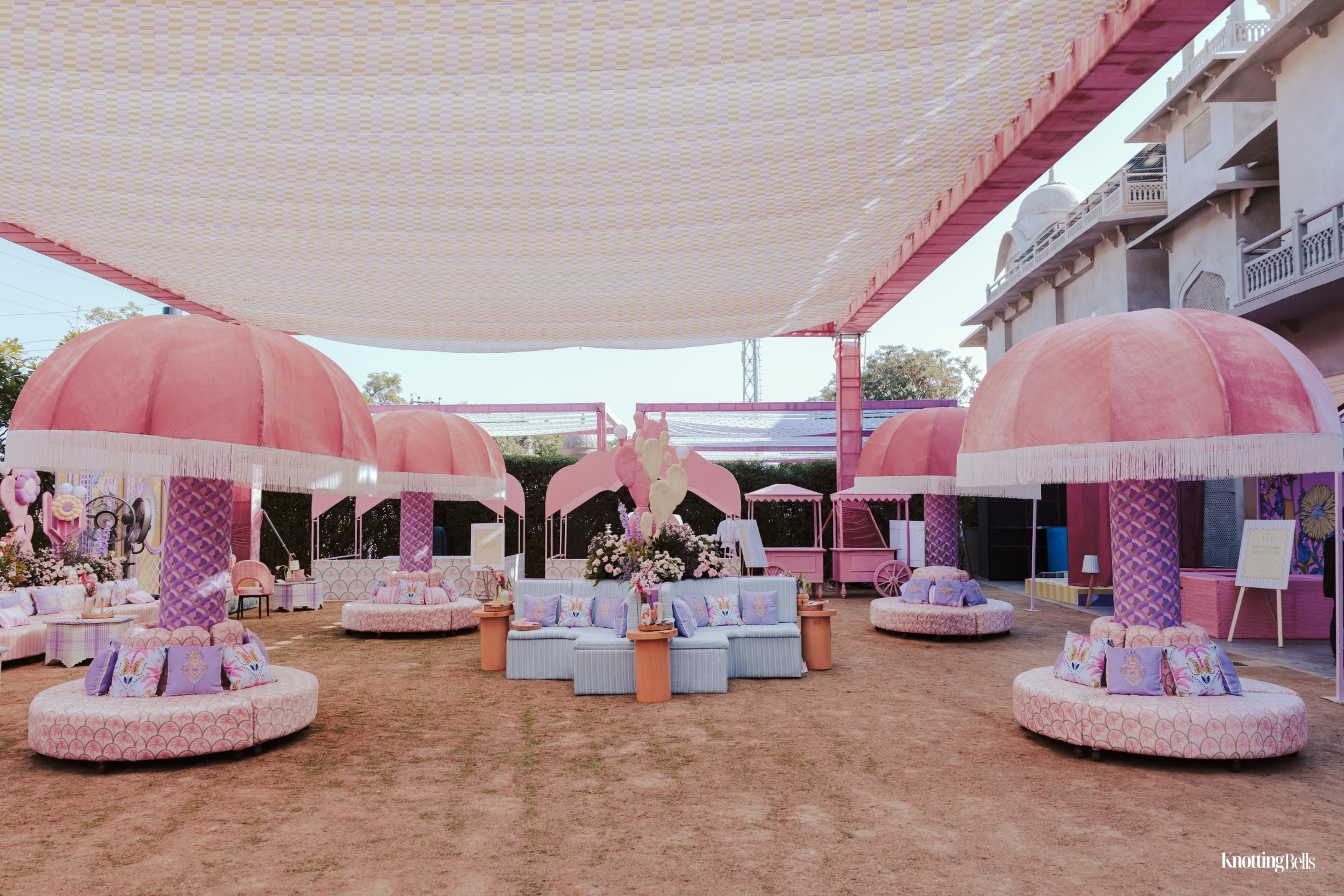 Lala Love Land event venue with pink umbrella seating